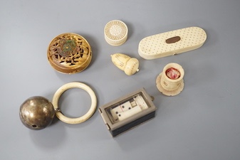 A collection of ivory objects, to include a manju netsuke, a needle box, miniature dominos, etc., 19th century